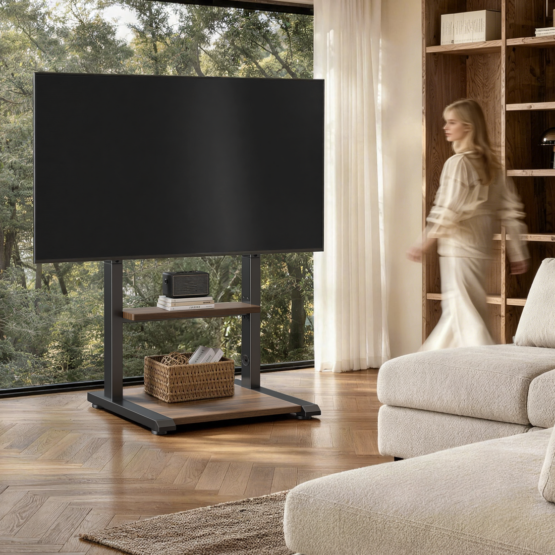 Sturdy floor TV stand with a wide base supporting a large TV in a living room with a pet nearby, designed for stable home entertainment setups.